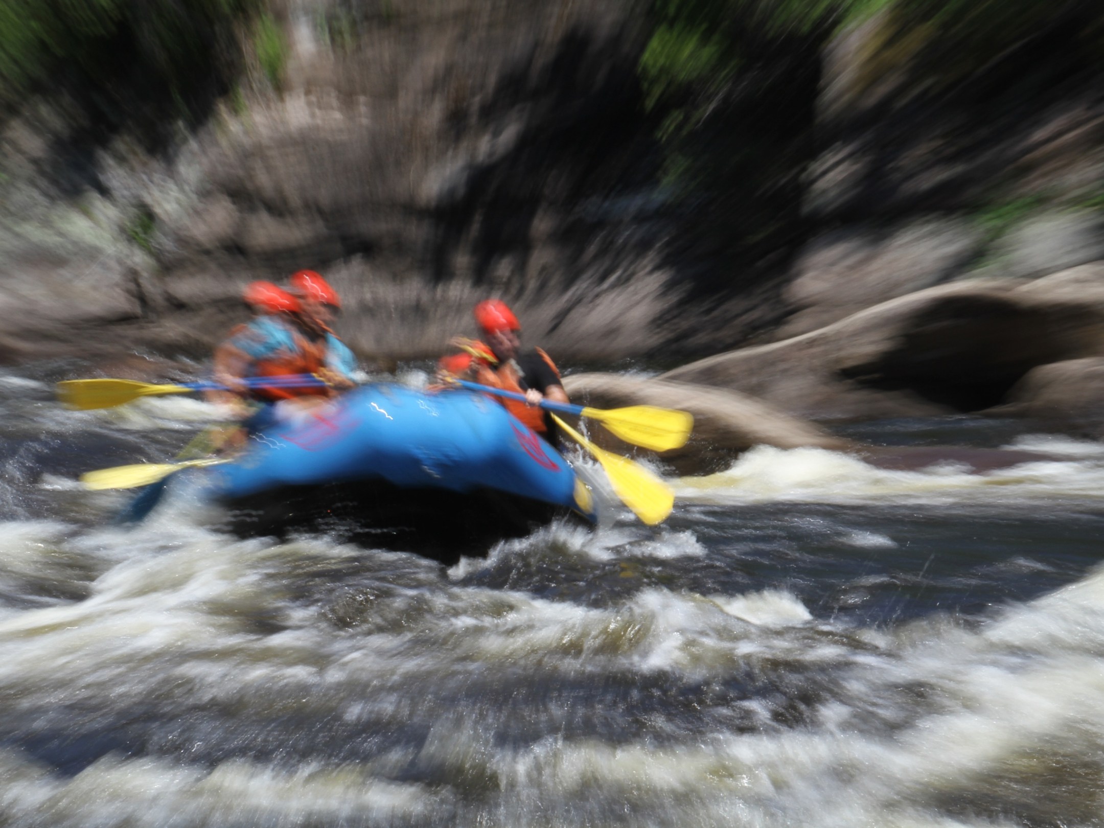 a blurry image of a river next to a body of water