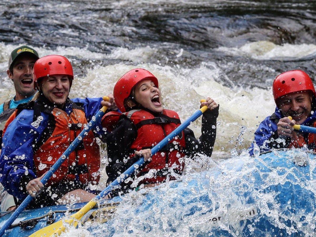 a young child riding on a raft in the water