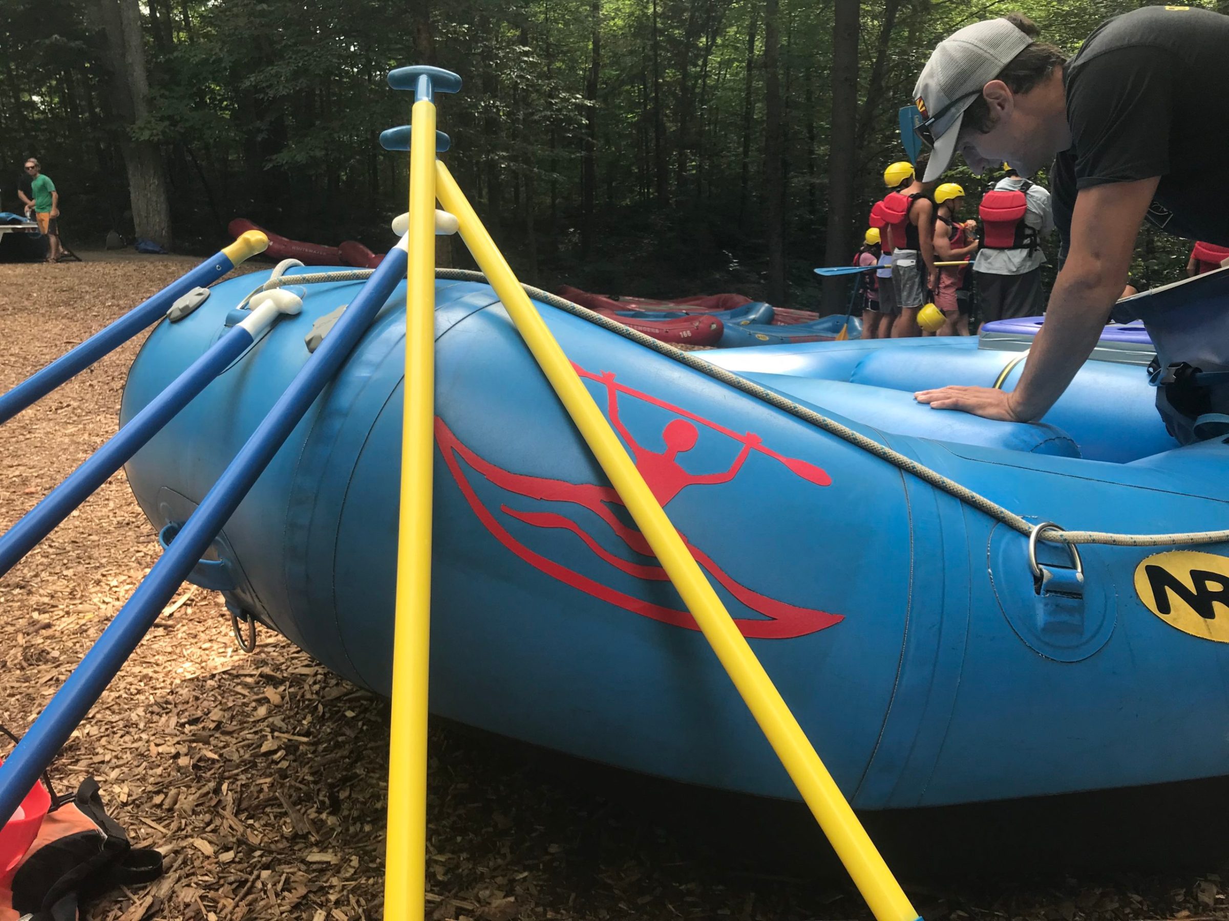 a person riding on the back of a boat