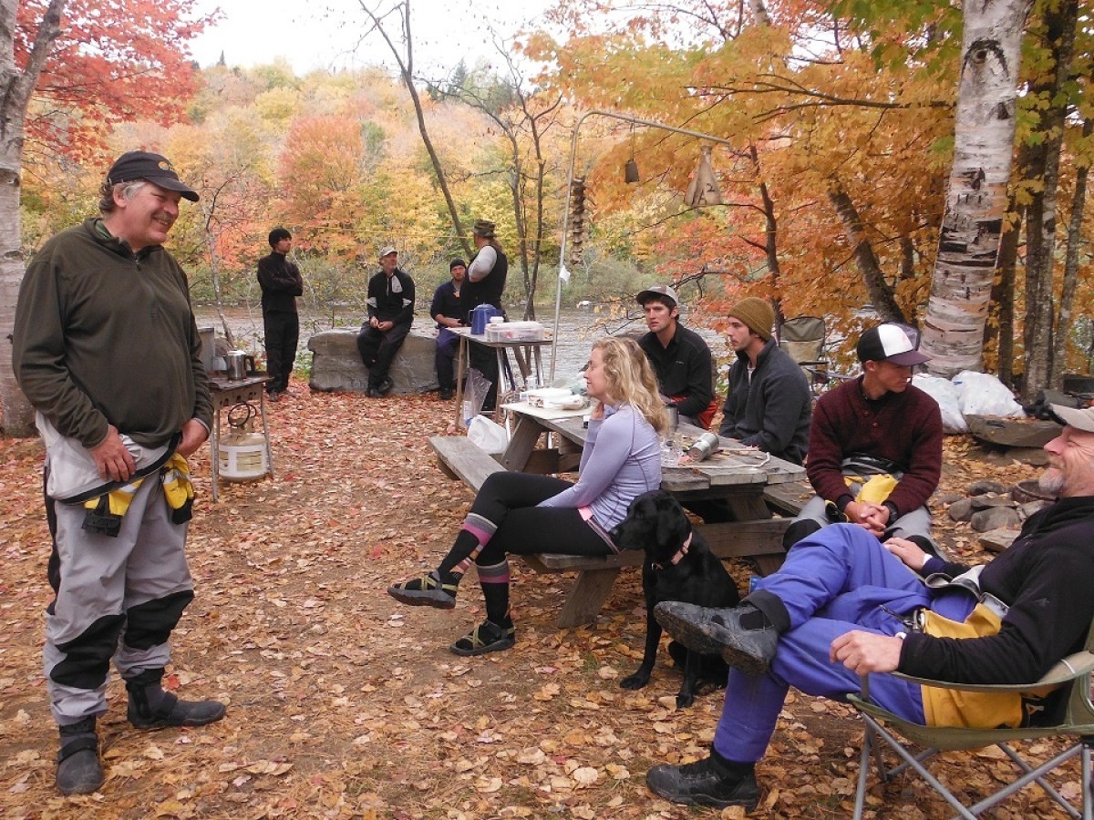 a group of people sitting at a park